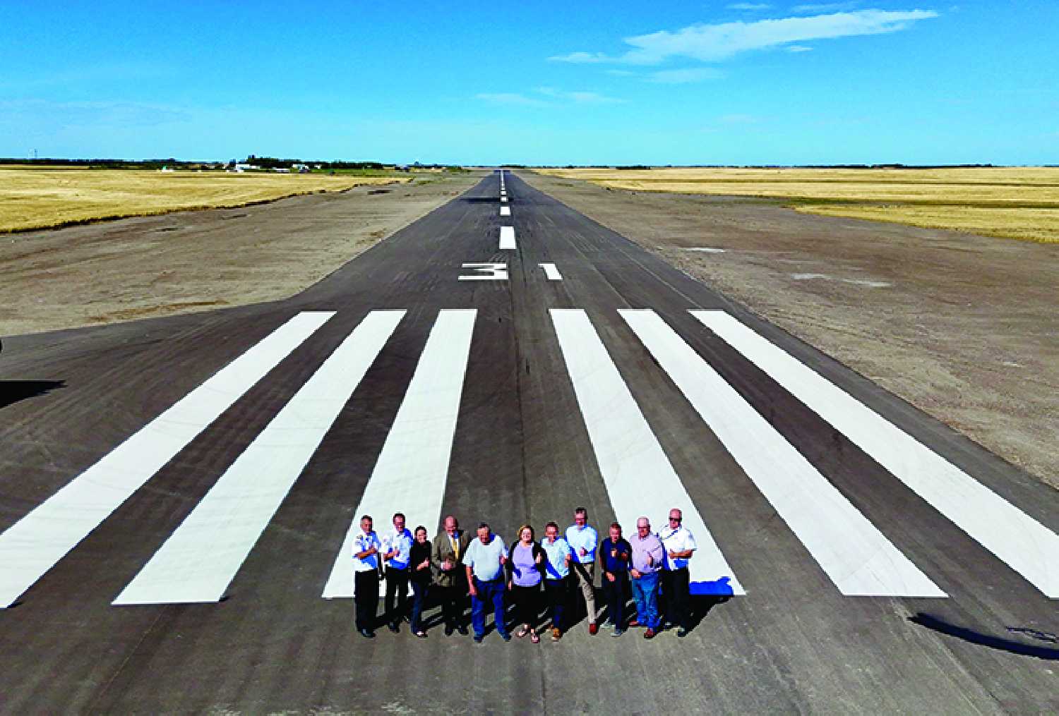 The new 5,000 foot runway at Moosomin Airport. Saskatchewan Highways Minister Lori Carr visited Moosomin Tuesday to see the expanded airport. This view from the south end of the runway shows the scale of the project.